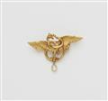 An Art Nouveau 18k gold griffon brooch with diamond droplet. - image-1