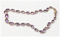 A Victorian 14k red gold and graduated amethyst necklace. - image-2