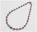 A Victorian 14k red gold and graduated amethyst necklace. - image-1