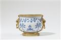 A Chinese porcelain bowl in Louis XVI ormolu mountings - image-2