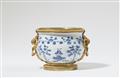 A Chinese porcelain bowl in Louis XVI ormolu mountings - image-1