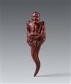 A black and red-lacquered softwood netsuke of a man rising from a cloud. 19th century - image-1