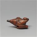 A boxwood netsuke of a yamabushi inside a hora. Early 19th century - image-2