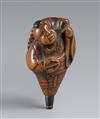 A boxwood netsuke of a yamabushi inside a hora. Early 19th century - image-1