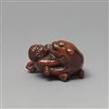 Netsuke des Busho einen Tiger bezwingend. Buchsbaum. 18./frühes 19. Jh. - image-3