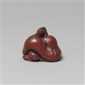 A Ise-Yamada wood netsuke of a tanuki smothering a hunter by Masakazu. Second half 19th century - image-2