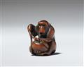 A Kyoto boxwood netsuke of a monkey with a peach by Mitsuhide. Early 19th century - image-2