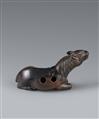 A large probably kaki wood netsuke of a recumbent stallion. 19th century - image-4