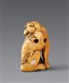 An ivory netsuke of a seated tiger. 18th century - image-2