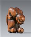 A unusual Kyoto boxwood netsuke of a tiger. Late 18th century - image-1