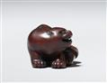 A wood netsuke of a crouching tiger. 19th century - image-6