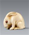 A large Kyoto ivory netsuke of a hare by Kiyotada. Early 19th century - image-1