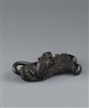 A large black wood netsuke of a frog on a folded lotus leaf. 19th century - image-2