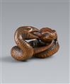 A boxwood netsuke of a snake and toad by Koichi. 19th century - image-1