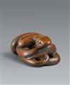 A boxwood netsuke of a coiled snake. 19th century - image-1