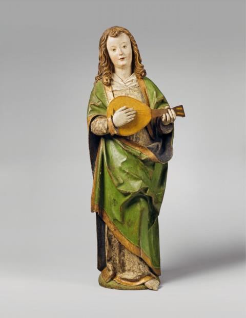  Master of Heiligenblut - A PAIR OF CARVED LIME WOOD FIGURES OF ANGELS PLAYING MUSIC, MASTER OF THE HOLY BLODD