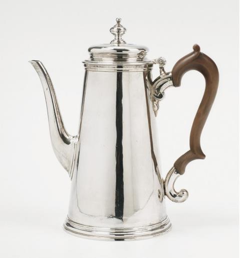 Benjamin Godfrey - A George II silver coffee pot. Engraved with a coat-of-arms and motto 'SENECTUTEM OBLECTANT'. Marks of Benjamin Godfrey, London 1736.