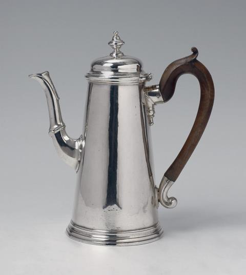 Edward Feline - A George II London silver coffee pot. Monogrammed and inscribed with the weight "25-3" to the underside. Marks of Edward Feline, 1734/35.