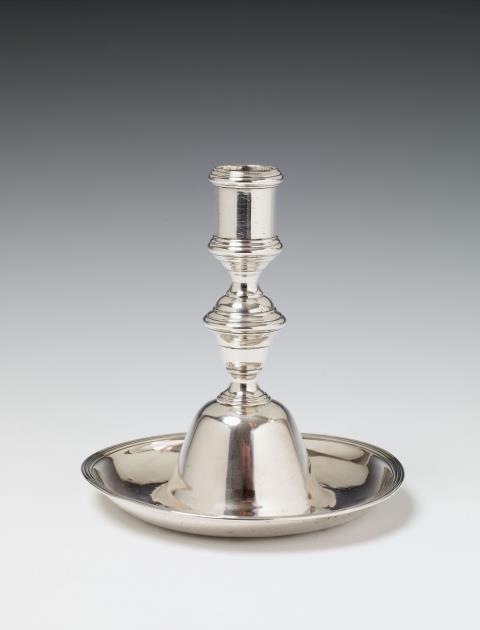 Friedrich Reinhard Schrödel - A Dresden silver candlestick. Engraved with the silver weight and inventory no. 1 to the underside. Marks of Friedrich Reinhard Schrödel, 1770.