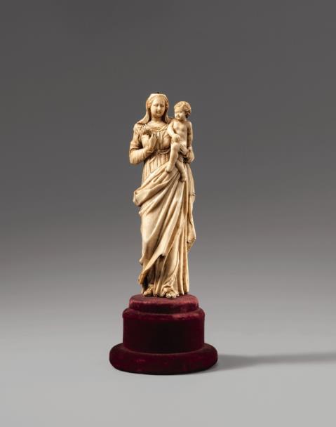  South France - A 17th century probably Southern French ivory figure of the Virgin with Child.
