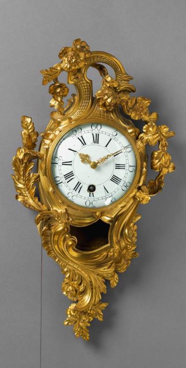 Jean-Joseph de Saint-Germain - An époque Louis XV ormolu cartouche-form cartel clock.