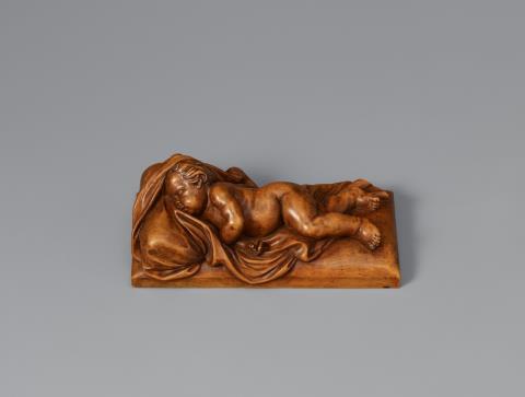 S. Trübel - A German carved boxwood depiction of a sleeping child.