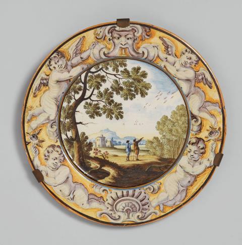 Carlo Antonio Grue - A small maiolica plate with landscape decor