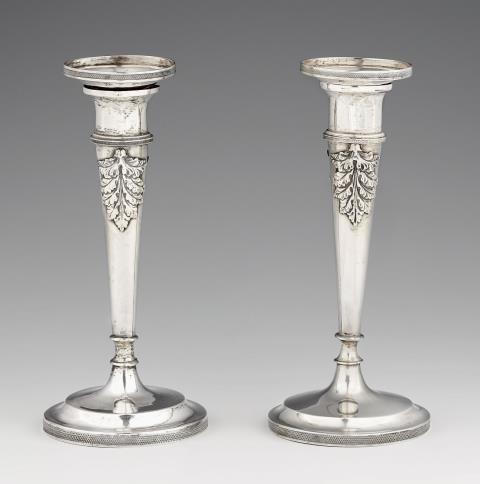 Heinrich Riesing - A pair of Würzburg silver candlesticks