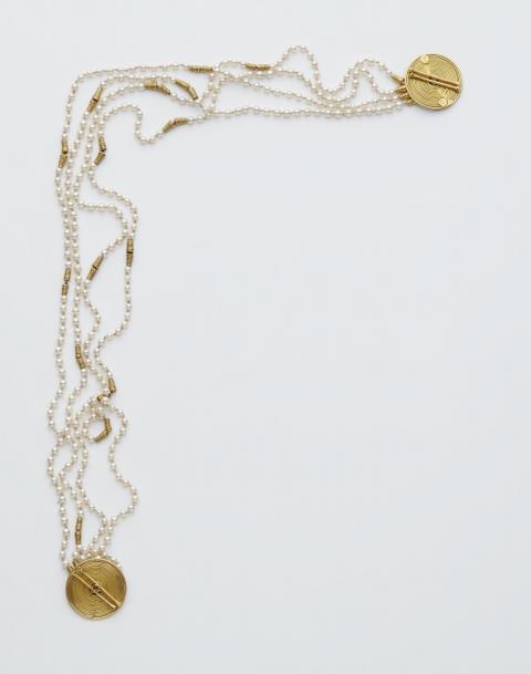 Herbert Fischer - An 18k gold pearl sautoir with adjustable clasps