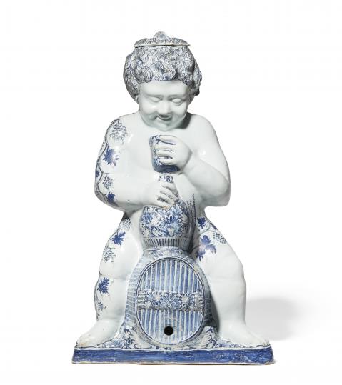  Rouen - A faience model of Bacchus on a barrel