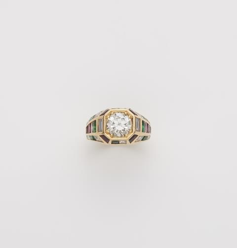 Heinrich Abeler - A German 18k gold gemstone and diamond solitaire ring.