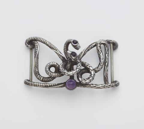 Léopold van Strydonck - A Belgian silver and amethyst Art Nouveau belt buckle.