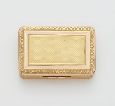 Frères Toussaint - A German neoclassical 14k bicolour gold snuff box.