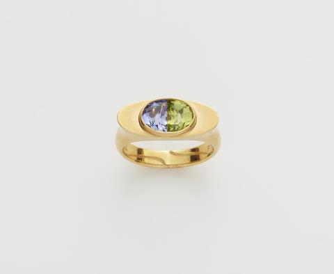 Irmela Grigo - A German 14k gold tanzanite and peridot ring.