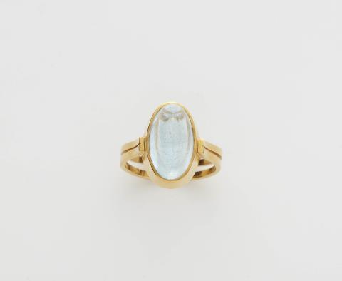 Irmela Grigo - A German 14k gold and sugarloaf-cut natural sky blue topaz ring.