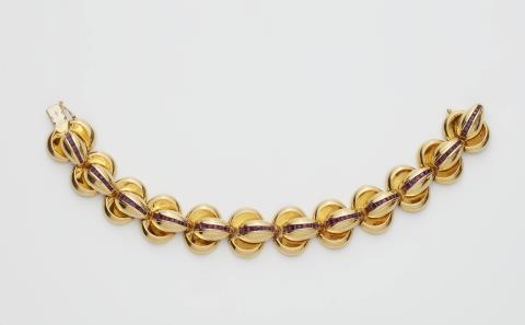 Gioielleria Favero - An Italian 18k gold and ruby chain bracelet.