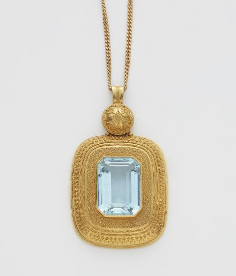 Franz Valentin - A German 18k gold granulation and emerald-cut aquamarine pendant with attached chain.