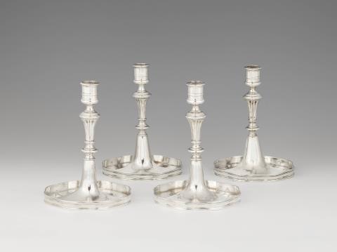 Franz Eylly - A set of four Vienna silver card players' candlesticks