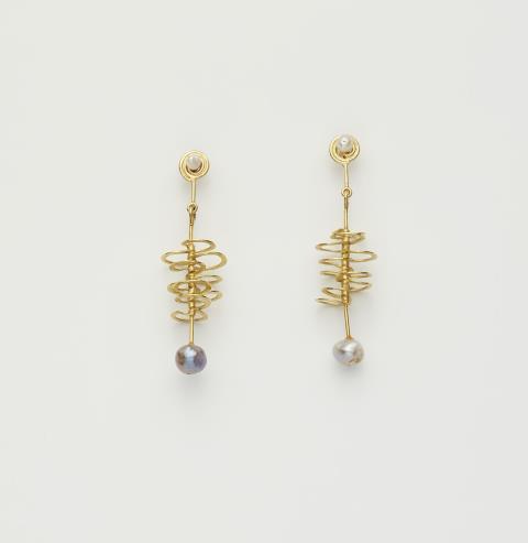 Albert Sous - A pair of German 18k gold and pearl pendant earrings.