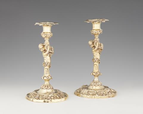 Thomas Gladwin - A pair of George II silver gilt candlesticks